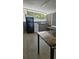 Kitchenette area featuring standard appliances and ample counter space at 2102 W Ivy St, Tampa, FL 33607