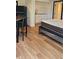 Comfortable studio apartment with kitchenette and wood laminate flooring at 2102 W Ivy St, Tampa, FL 33607