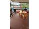 Enclosed sunroom offering a cozy space for relaxation and casual dining at 2102 W Ivy St, Tampa, FL 33607