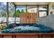 Hot tub with a wood surround at 2940 Bay View Dr, Safety Harbor, FL 34695