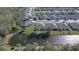 Aerial view of the community pond at 31841 Larkenheath Dr, Wesley Chapel, FL 33543