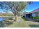 Backyard overlooking tranquil pond at 31841 Larkenheath Dr, Wesley Chapel, FL 33543