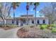Clubhouse with manicured landscaping at 31841 Larkenheath Dr, Wesley Chapel, FL 33543