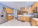 Well-equipped kitchen featuring stainless steel appliances, ample counter space, and an open design at 31841 Larkenheath Dr, Wesley Chapel, FL 33543