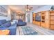 Inviting living room with views to the kitchen and dining area, perfect for entertaining guests at 31841 Larkenheath Dr, Wesley Chapel, FL 33543