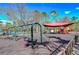 Fun playground featuring swings, slides, and a shaded play area for children to enjoy at 31841 Larkenheath Dr, Wesley Chapel, FL 33543