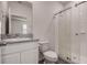 Bathroom featuring vanity with granite countertop and glass shower door at 3624 Autumn Amber Dr, Spring Hill, FL 34609
