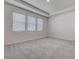 An empty bedroom offers a neutral canvas with ample natural light, ready for personalized design at 3624 Autumn Amber Dr, Spring Hill, FL 34609