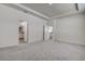 Spacious bedroom features neutral walls, carpet, and an ensuite bathroom at 3624 Autumn Amber Dr, Spring Hill, FL 34609