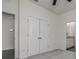 Spacious bedroom featuring carpet floors and walk-in closet with double doors at 3624 Autumn Amber Dr, Spring Hill, FL 34609