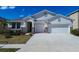 Beautiful single Gathering home with two-car garage and stone veneer accents at 3624 Autumn Amber Dr, Spring Hill, FL 34609