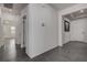 Hallway featuring tile floors and access to other rooms in the house at 3624 Autumn Amber Dr, Spring Hill, FL 34609