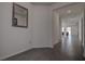 Hallway with gray tile floors leading to living space at 3624 Autumn Amber Dr, Spring Hill, FL 34609