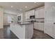 Well-lit kitchen showcasing granite counters, modern appliances, and ample cabinet space at 3624 Autumn Amber Dr, Spring Hill, FL 34609