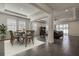 Open-concept living and dining area filled with natural light at 3624 Autumn Amber Dr, Spring Hill, FL 34609