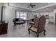 Elegant living room featuring tile floors, recessed lighting, and seamless open layout at 3624 Autumn Amber Dr, Spring Hill, FL 34609