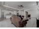 Spacious living area with open floor plan, seamlessly connected to a modern kitchen at 3624 Autumn Amber Dr, Spring Hill, FL 34609