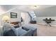 Bonus room offering seating, a piano, and extra space for relaxing at 4110 Highland Park Cir, Lutz, FL 33558