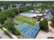 Aerial view of community pool, tennis, and basketball courts at 4110 Highland Park Cir, Lutz, FL 33558