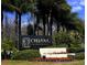 Entrance to Cheval Golf and Country Club with beautiful landscaping at 4110 Highland Park Cir, Lutz, FL 33558