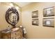 Stylish powder room features a decorative mirror, designer sink, and unique wall accents at 4110 Highland Park Cir, Lutz, FL 33558