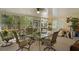 Covered screened-in patio provides a relaxing and bug-free outdoor space at 6524 Coronet Dr, New Port Richey, FL 34655