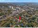 Expansive aerial view showcasing the property's location, nearby city amenities, and beautiful bay views at 6935 Date Palm S Ave, St Petersburg, FL 33707