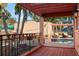 Outdoor patio area with comfortable seating, a pergola, and a swimming pool at 6935 Date Palm S Ave, St Petersburg, FL 33707