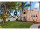 Serene backyard view showcasing the property's well-maintained landscaping and quiet ambiance at 6935 Date Palm S Ave, St Petersburg, FL 33707