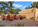 Stylish patio area with comfortable seating around a fire pit, perfect for outdoor relaxation at 6935 Date Palm S Ave, St Petersburg, FL 33707