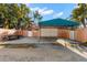 Spacious driveway with covered parking and a trailer at 6935 Date Palm S Ave, St Petersburg, FL 33707