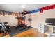 This exercise room features weightlifting equipment, workout machines and a desk area at 6935 Date Palm S Ave, St Petersburg, FL 33707