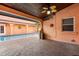 Outdoor patio with a view of the pool, textured exterior, and ceiling fans at 6935 Date Palm S Ave, St Petersburg, FL 33707