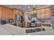 Updated kitchen features stainless steel appliances, quartz countertops, and tile backsplash at 7325 S Trask St, Tampa, FL 33616