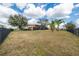 Large, fenced backyard providing plenty of space for recreation and privacy at 9707 Cabernet Ave, Seffner, FL 33584