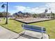 A park featuring a playground with swings, slides, climbing structures, and a covered picnic area at 13218 Satin Lily Dr, Riverview, FL 33579