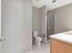 Bathroom featuring gray walls, tile flooring, and a shower at 1120 E Kennedy Blvd # 1523, Tampa, FL 33602