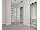 Bedroom with a window view and closet with sliding doors and built-in shelves at 1120 E Kennedy Blvd # 1523, Tampa, FL 33602