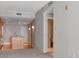 Modern living room featuring an open floor plan and views of the kitchen and hallway at 1120 E Kennedy Blvd # 1523, Tampa, FL 33602