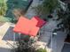 Overhead view of covered shelter with red roof located next to sidewalk and small trees at 1120 E Kennedy Blvd # 1523, Tampa, FL 33602