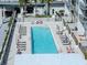 A refreshing swimming pool surrounded by lounge chairs and palm trees, perfect for relaxing at 1120 E Kennedy Blvd # 1523, Tampa, FL 33602