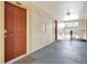 Condo hallway with unit number on the door and stairs leading to the next level at 11901 4Th N St # 6303, St Petersburg, FL 33716