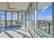 Bright, open space featuring expansive windows providing stunning city and waterfront views, plus a unique ceiling fan at 1208 E Kennedy Blvd # 1115, Tampa, FL 33602