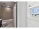 Neutral bathroom next to the bedroom, with a large window for plenty of natural light at 1208 E Kennedy Blvd # 1115, Tampa, FL 33602