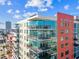 Exterior of modern condo building, multiple stories with balconies overlooking downtown at 1208 E Kennedy Blvd # 1115, Tampa, FL 33602