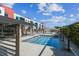 Community hot tub area with seating and landscaping with views of the building at 1208 E Kennedy Blvd # 1115, Tampa, FL 33602