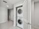 This space features a stacked washer and dryer, conveniently located near living areas at 1208 E Kennedy Blvd # 1115, Tampa, FL 33602