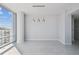 Open floor plan with modern lighting and expansive views from large windows with an elegant tile floor at 1208 E Kennedy Blvd # 1115, Tampa, FL 33602