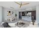 Airy open-concept living, dining, and kitchen space enhanced by modern fixtures and finishes, plus ample natural light at 1208 E Kennedy Blvd # 1115, Tampa, FL 33602