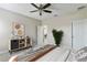 Inviting bedroom with warm tones, a cozy bed, and modern decor, creating a relaxing atmosphere at 12326 Terracina Chase Ct, Tampa, FL 33625
